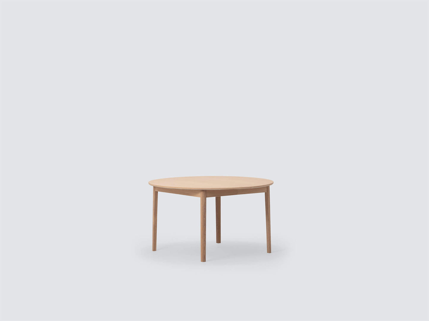 Ease Round Expandable Dining Table