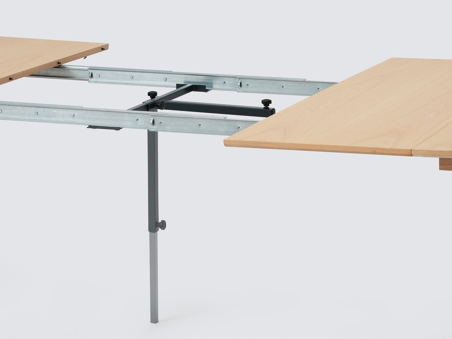 Ease Round Expandable Dining Table